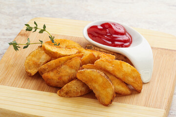 Fried rustic potato with tomato ketcup