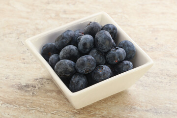 Sweet ripe blueberry heap in the bowl