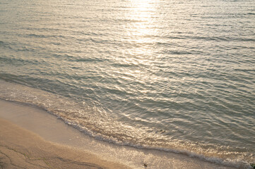 沖縄　夕日に照らされた海岸