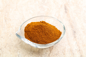 Dry Paprika powder in the bowl