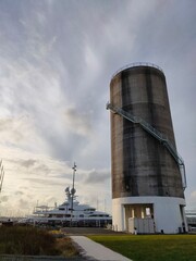 ancient silo and modern yacht