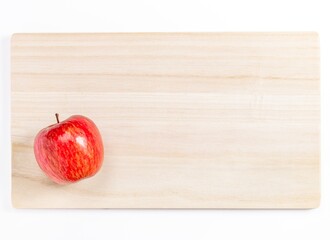 A Red Apple Fruit on A Wooden Cutting Board, Autumn or Fall Background, Cooking Image	
