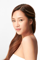 Fototapeta premium Beautiful young asian woman with clean fresh skin on white background, Face care, Facial treatment, Cosmetology, beauty and spa, Asian women portrait.