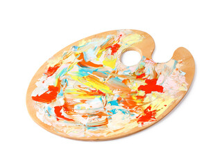 Wooden artist's palette with mixed paints isolated on white