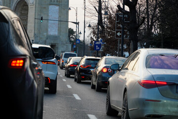 traffic. daytime photography. cars in traffic parked at a traffic light.