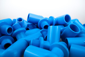Blue PVC pipe set, separate on a white background, blue plastic water pipe, PVC accessories for...