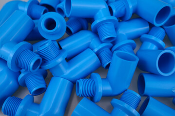 Blue PVC pipe set, separate on a white background, blue plastic water pipe, PVC accessories for...