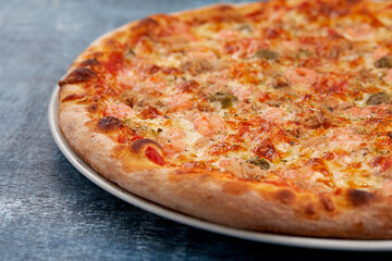 pizza on the wooden background