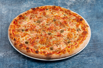 pizza on the wooden background