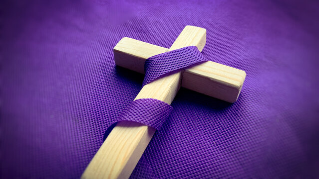 Good Friday, Lent Season and Holy Week concept - A Christian cross on purple background. Conceptual - Powered by Adobe