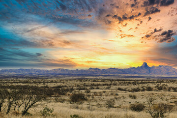 The Sonoran Desert grassland of Buenos Aires National Wildlife Refuge, Arizona, USA.  Vivid sunset...