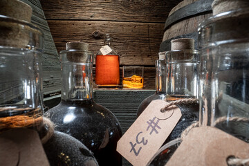 Hand crafted cognac in old distillery warehouse.