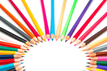 Colored pencils for drawing on a white background. Education and creativity. Leisure and art