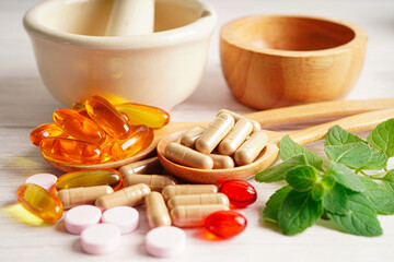 Alternative medicine herbal organic capsule with vitamin E omega 3 fish oil, mineral, drug with...