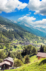 Fototapeta na wymiar Wooden houses in the Swiss Alps