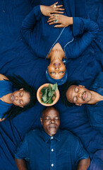 Portrait of african nature activists laying in a circle