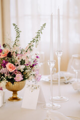 Flowers in Vase, Blank Nameplate and Candlesticks