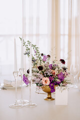 Bouquet in Vase, Blank Nameplate and Candlesticks