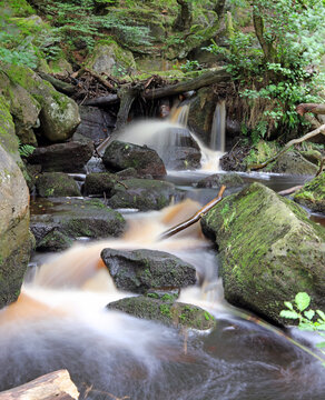 Long exposure image of a small waterfall Padley Gorge Derbyshire
