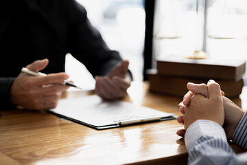 Client was listening to a lawyer advising on an embezzlement case, explaining the details of the...