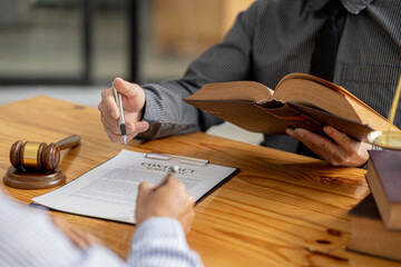Client was listening to a lawyer advising on an embezzlement case, explaining the details of the...