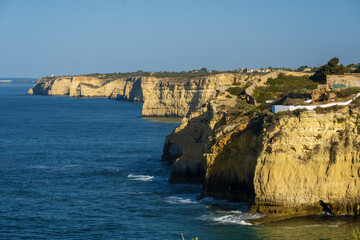 cliffs and rocks at Carvoeiro beach, Algarve, Portugal