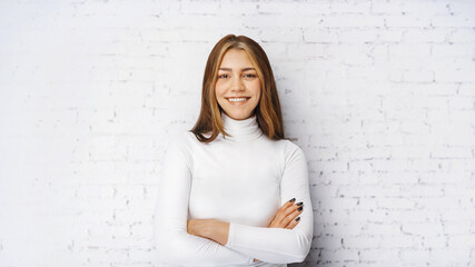 Fototapeta na wymiar portrait of young happy woman looks in camera