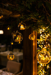 Decoration lights in the restaurant. Decoration for a room. Golden tree 