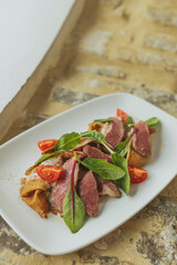 Delicious italian pasta. Portion of pasta with tomatoes and meat