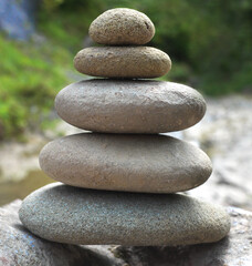 Fototapeta na wymiar Stacked Zen stones, peace and deliberation ... 