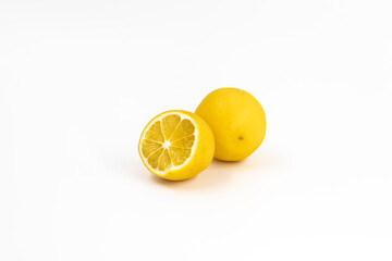 Two citrus fruits a hybrid of orange and lemon yellow color on a white background isolated