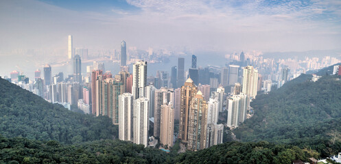 The City of Hong Kong shrouded in air pollution from motor vehicles, marine vessels and power...
