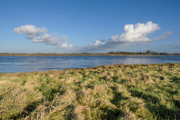 Fototapeta na wymiar River IJssel near Hattem on the backgroud the 