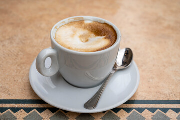 Fresh brewed coffee cappuccino in italian bar, morning coffee