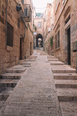 Fototapeta na wymiar Jerusalem Old City narrow streets with arches