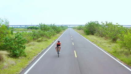 Asian young woman ride bicycle