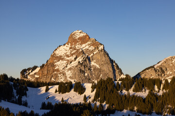 Wonderful mountain called Grosser Mythen in Switzerland who get illuminated by the sun. What an amazing morning hike in the Swiss alps.