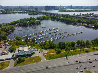 Kyiv, Ukraine. Panoramic view of Kyiv and river Dniepr and Vydubitskoe lake. Aerial drone view. - 490910494