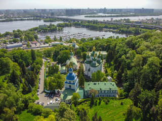 Kyiv, Ukraine. View to a monastery Vydubitsky and Dnieper River. Aerial drone view. - 490910499