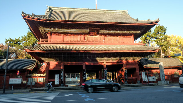 Historical temple gate in side of street Tokyo Japan