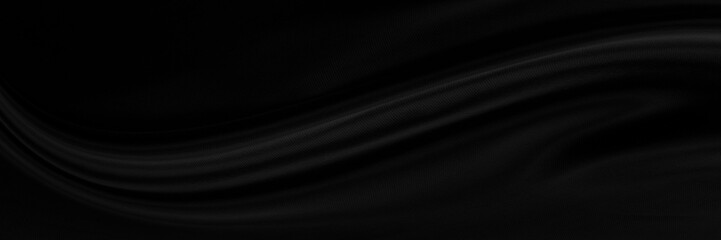 Black gray satin dark fabric texture luxurious shiny that is abstract silk cloth panorama background with patterns soft waves blur beautiful.