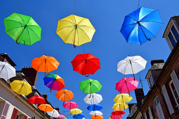 Fototapeta na wymiar Les Andelys; France - july 2 2019 : umbrellas in a street