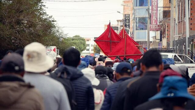 Festive Procession Of People During The Traditional Carnival In Bolivia