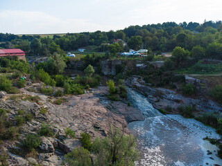 Stone shores of the Butsky canyon. Aerial drone view. Buky, Cherkasy region, Ukraine.