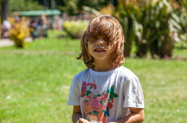 portrait of a happy girl in the park