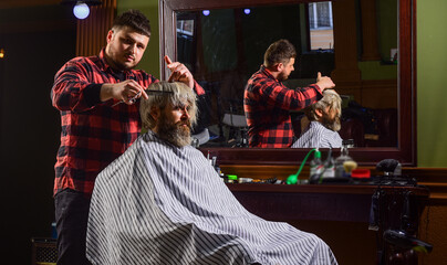 Guy with dyed hair. Donation and charity concept. Barber hairstyle barbershop. Hipster getting...