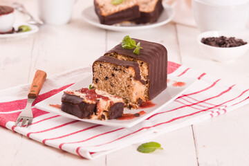 Sponge cake with chocolate frosting.