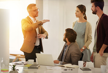 I think its time we broke some new ground. Cropped shot of a group of businesspeople in the boardroom.