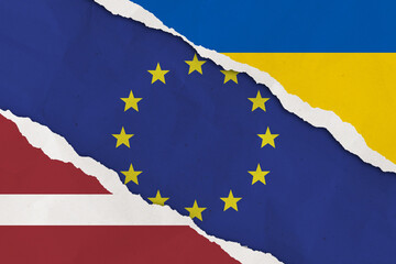 Ukraine, European Union, Latvia flag ripped paper grunge background