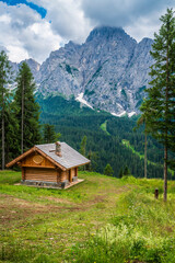Fototapeta na wymiar Sappada. Know the woods, the mountains and the villages. Dolomites.